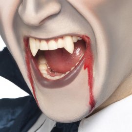 Copri denti a forma di canini da vampiro